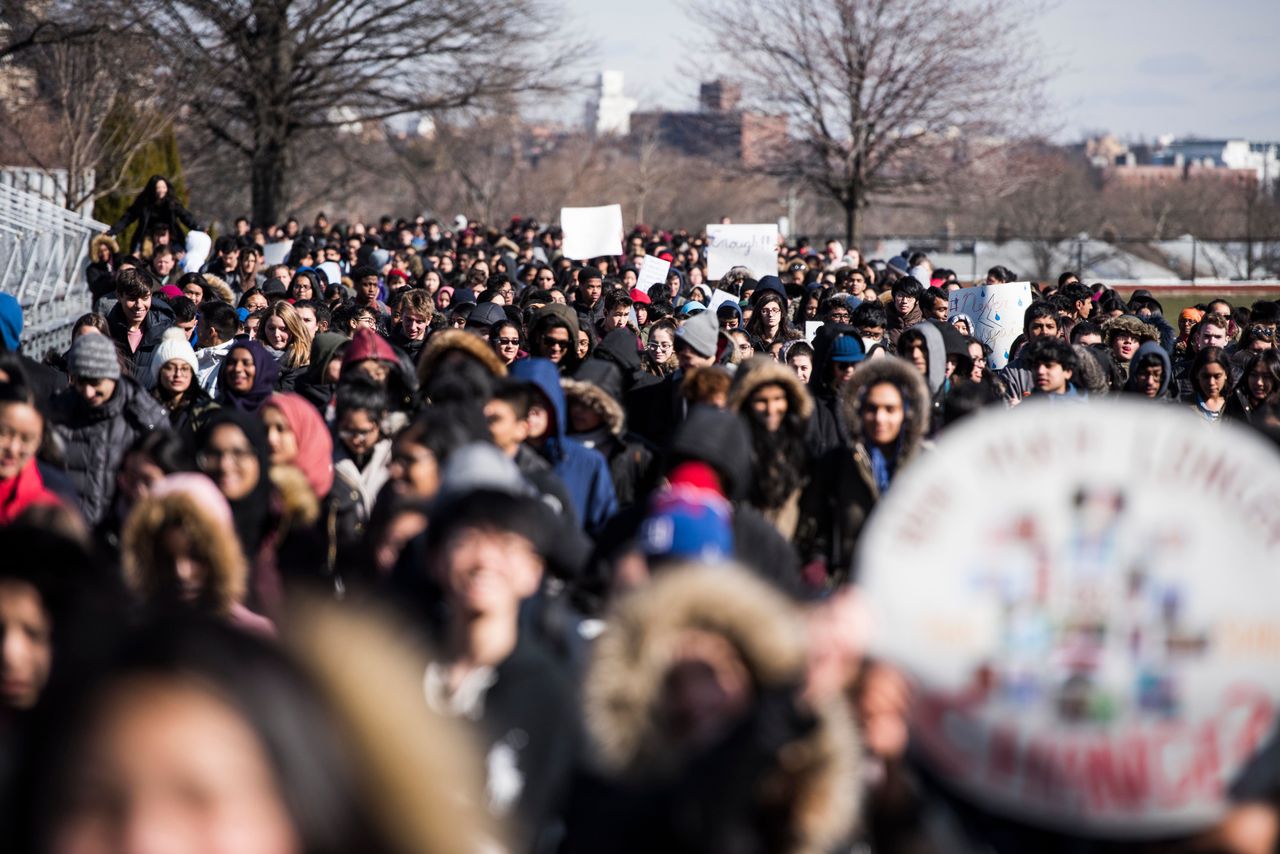Students of Townsend Harris High School in Queens, New York, take part in a nationwide student walkout in solidarity with other students around the country who are protesting for gun law reform on March 14, 2018.