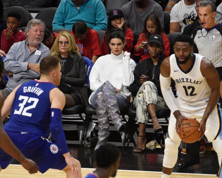 Kendall Jenner watches Blake Griffin play courtside. 