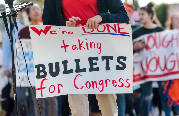 High school students in La Crescenta, California, take a moment of silence for the victims of last month's shooting in Parkland, Florida, on Wednesday.