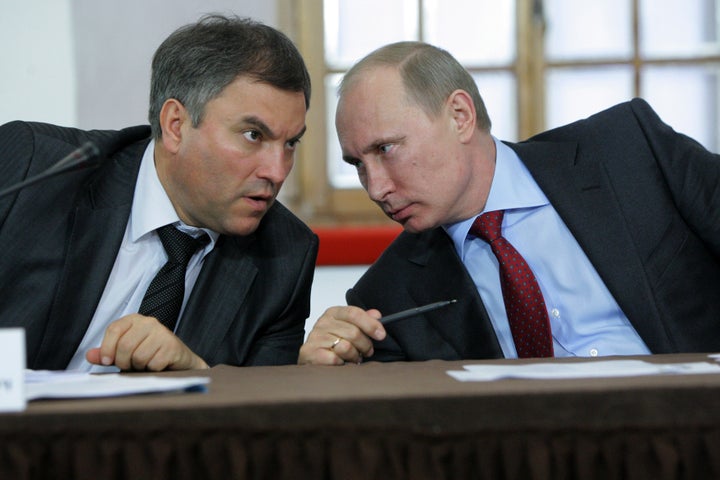 Putin talks to Vyacheslav Volodin in 2011.