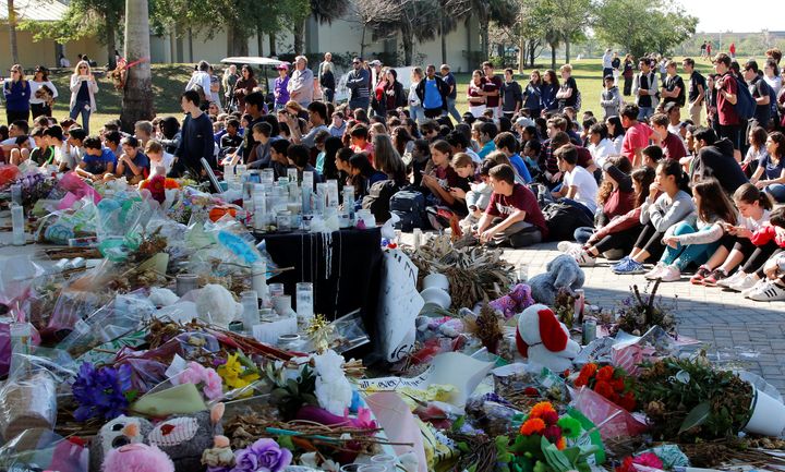 Students from Marjory Stoneman Douglas High School and Westglades Middle School gather to honor the 17 students and staff members killed at the high school in Parkland, Florida, last month.