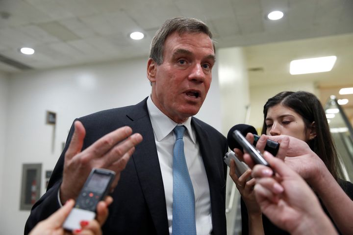 Sen. Mark Warner co-authored a provision that could upend FICO to the benefit of the three credit reporting firms.
