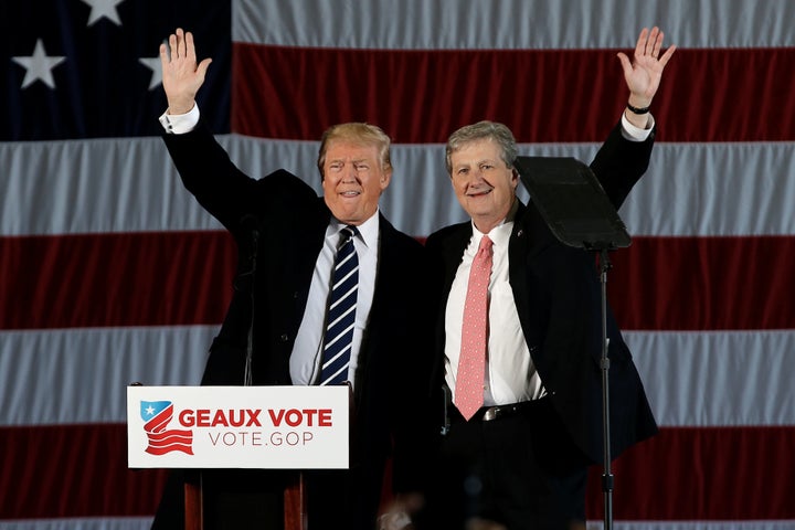 Sen. John Kennedy of Louisiana (right), pictured with President Donald Trump, says he's planning to introduce a bill to prohibit airlines from putting animals in overhead bins. He also has said America doesn't need new gun laws.