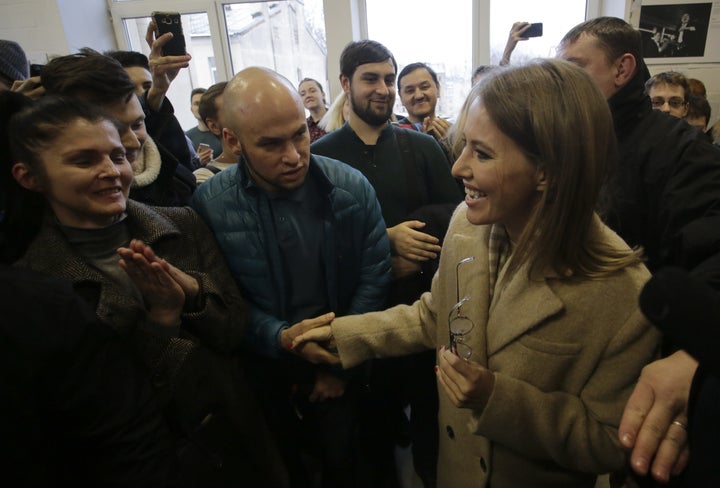 Russian TV personality and opposition activist Ksenia Sobchak (R), who announced plans to run in the upcoming presidential election, meets with supporters in Saint Petersburg, Russia, Dec. 2, 2017.