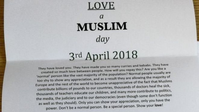 A close-up of a "Love a Muslim" letter created by Shahab Adris.