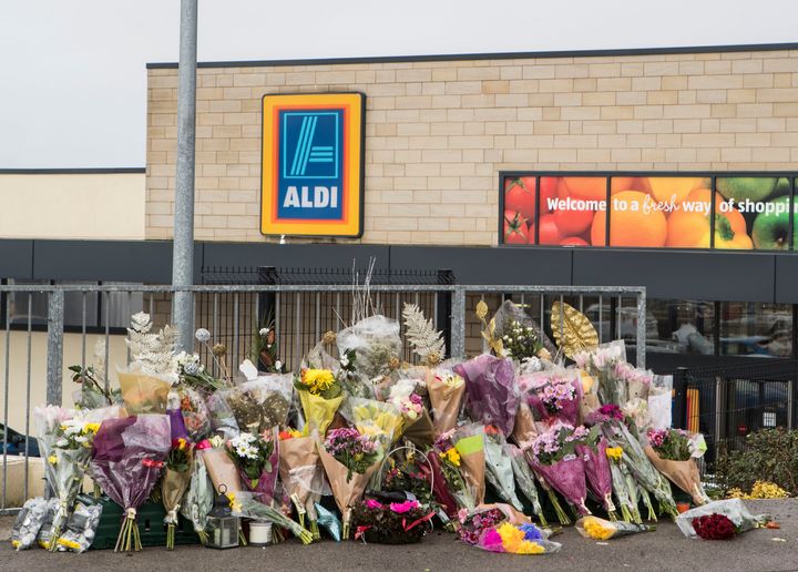 Floral tributes outside the Aldi supermarket in Skipton where Willsher was murdered days before Christmas