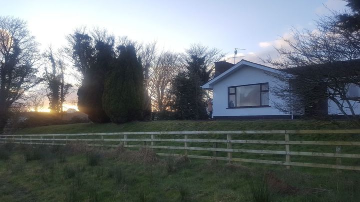 Seamas O'Reilly's family home on the border of Derry and Donegal. An explosion at a nearby former checkpoint blew out their windows during the Troubles. 