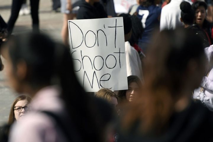 High school students at the Denver State Capitol take part in a national walkout to protest gun violence. 