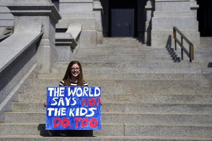 Isabella Yow 16, sophomore at Cherry Creek High School makes one more picture as she joined students at the Denver State Capitol and schools across the nation with walkouts/gun violence protests on the one month anniversary of the Parkland, Florida shooting. March 14, 2018 Denver, Colorado. 