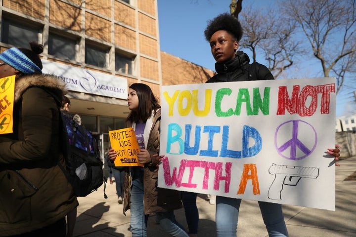 Students from Josephinum Academy in Chicago take part in a national walkout to protest gun violence. 