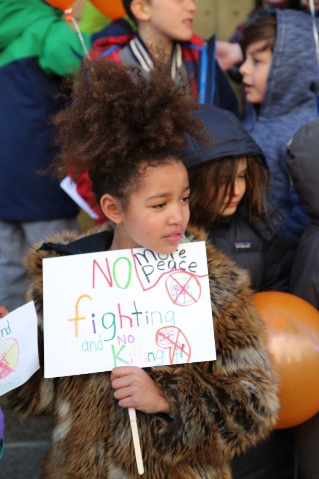 Students at Science, Language and Arts International School in Brooklyn, New York take part in a national walkout to protest gun violence. 