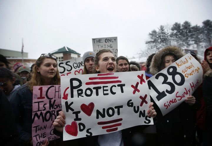 Students at Yarmouth High School chant during a walkout to protest gun violence in Yarmouth, Maine. 
