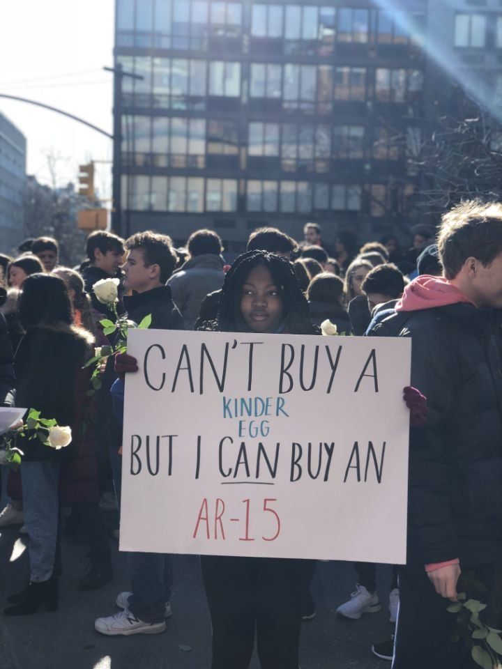 A student from Grace Church School in New York City holds a sign made for the day’s protests. 