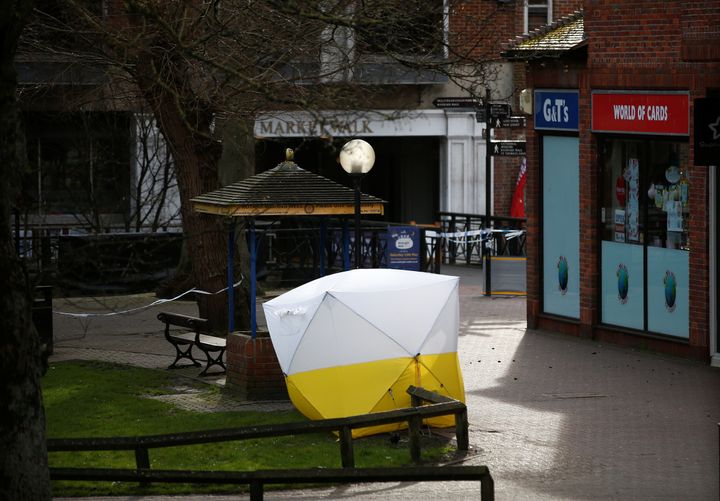 A tent covers the Salisbury park bench where Sergei and Yulia Skripal were found slumped after being poisoned