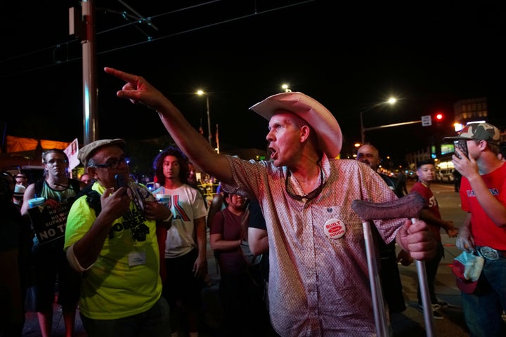 Pro-Trump supporters face off with anti-Trump protesters outside a Donald Trump campaign rally in Phoenix, Arizona, in August 2017.