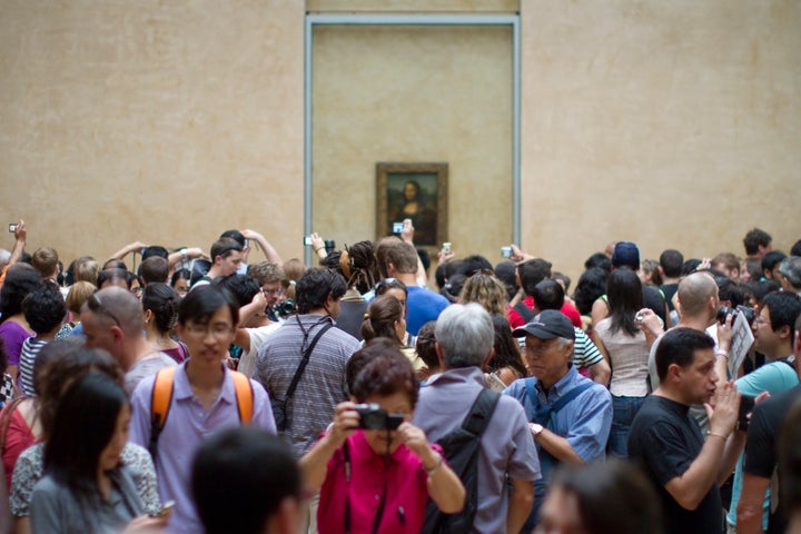 The Louvre in Paris can be packed during summer months. 