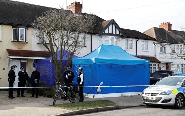 Police on duty outside Glushkov's home in New Malden