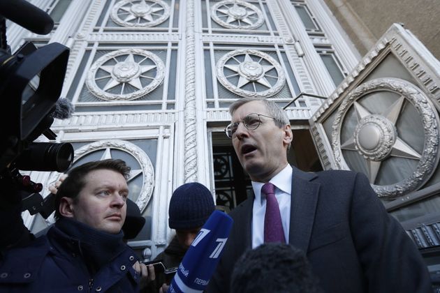 Laurie Bristow mets reporters as he leaves the Russian foreign ministry