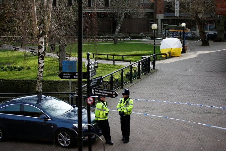 A police officer stands at a cordon around the bench where former Russian intelligence agent Sergei Skripal and his daughter Yulia were found after they were poisoned, in Salisbury, Britain March 14, 2018.