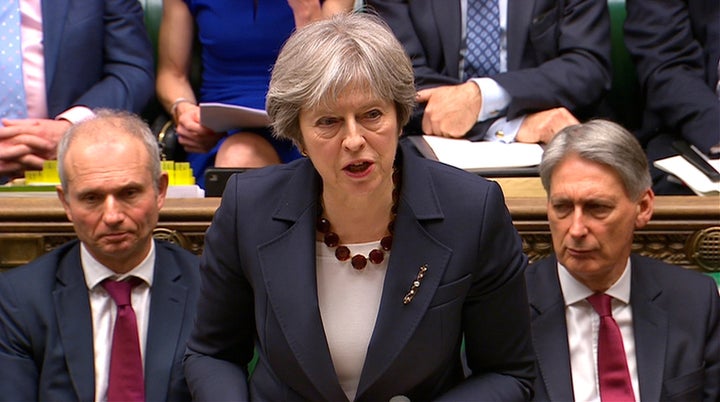 Prime Minister Theresa May addresses the House of Commons on her government's reaction to the poisoning of former Russian intelligence officer Sergei Skripal and his daughter Yulia in Salisbury, in London, March 14, 2018. 