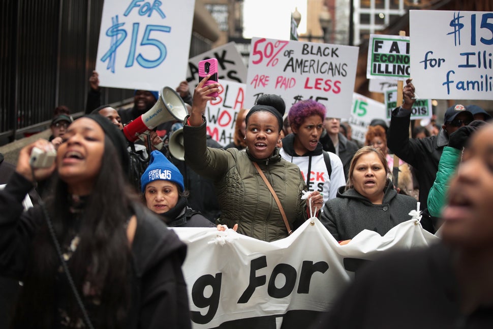 Chicago demonstrators protest for higher wages and better working conditions on the 49th anniversary of the murder of Martin