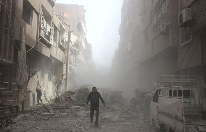 Buildings are damaged after airstrikes in eastern Ghouta, near Damascus, Syria, on Monday.