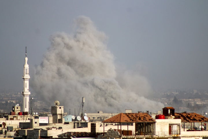 Smoke rises over Kafr Batna on Friday.