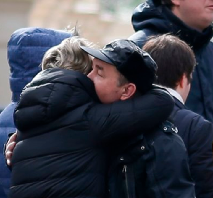 Crowds embraced each other during the farewell