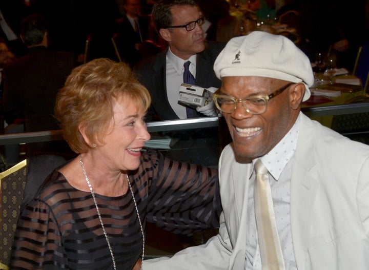 Judge Judy and Samuel L. Jackson sharing a laugh. 