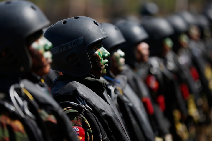 Myanmar miltary commandos stand in formation during exercises on Feb. 3, 2018.