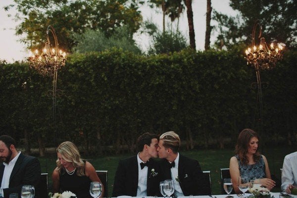 Ditch the sweetheart table so you don't feel like you're on display.