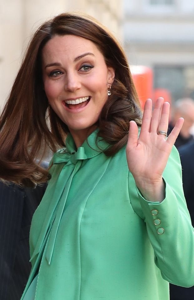 The Duchess wore a bespoke Jenny Packham coat, with a bow necktie, and accessorized with earrings she’s worn before. 
