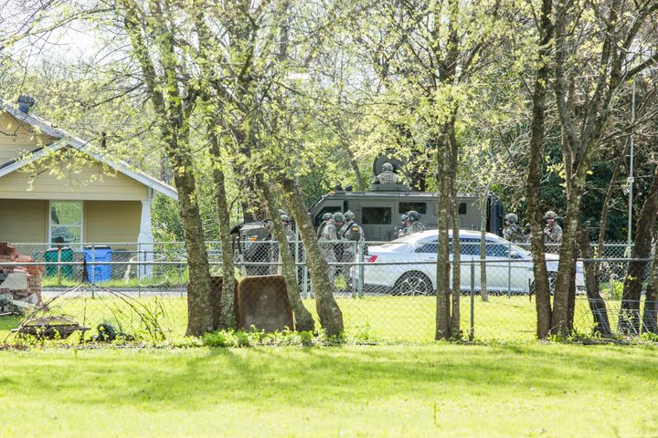Police barricade the area surrounding the home of suspected Austin bomber Mark Anthony Conditt in Pflugerville, Texas.