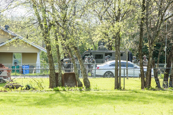 Police barricade the area surrounding the home of suspected Austin bomber Mark Anthony Conditt in Pflugerville, Texas.