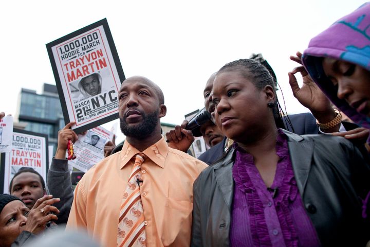 Tracy Martin, left, father of slain Florida teen Trayvon Martin, and Sybrina Fulton, Trayvon's mother, join the Million Hoodi