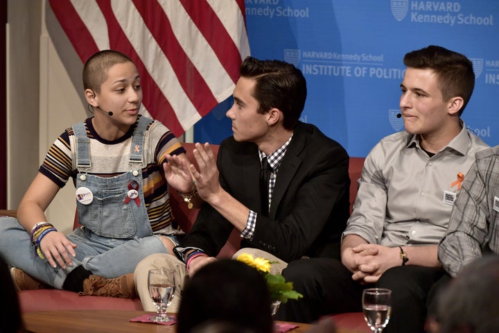 Survivors of the Marjory Stoneman Douglas High School shooting Emma Gonzalez, David Hogg, center, and Cameron Kasky speak at a panel discussion at Harvard University on Tuesday.