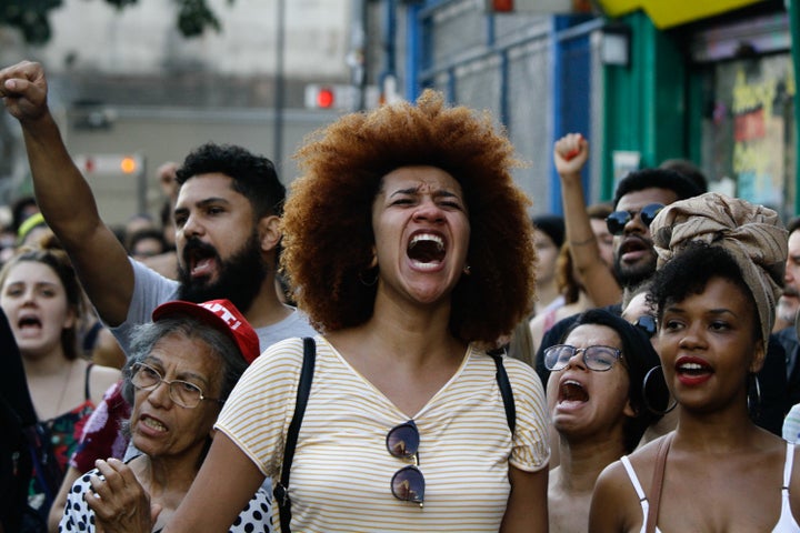 Demonstrators in São Paulo react with grief and anger on March 18, 2018, several days after Marielle Franco was shot dead in Rio de Janeiro with her driver, Anderson Pedro Gomes.