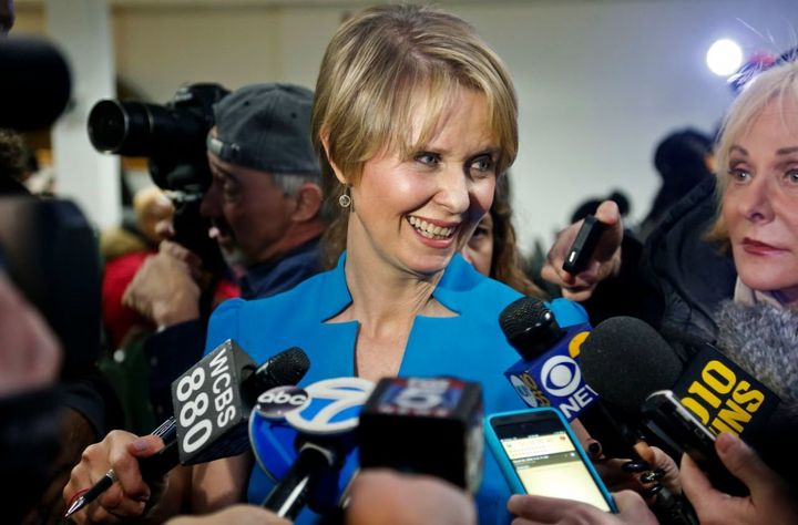 Candidate for New York governor Cynthia Nixon speaks with reporters at her first campaign stop, in the Brownsville section of Brooklyn, in New York. Nixon will challenge New York Gov. Andrew Cuomo for the Democratic nomination. 