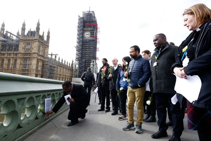 Members of the public pay their respects on Westminster Bridge today