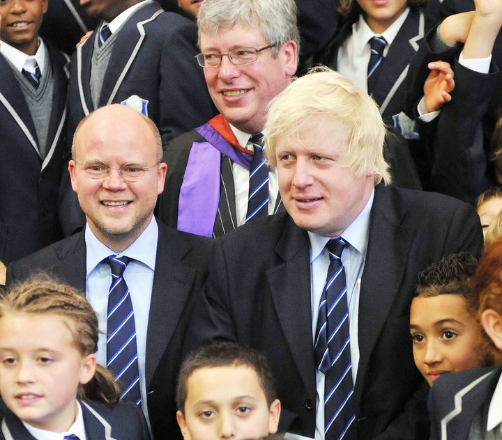 <strong>London Mayor Boris Johnson (centre right) and Toby Young (centre left) with Headmaster Thomas Packer (top centre) and the first students of the newly opened West London Free School</strong>