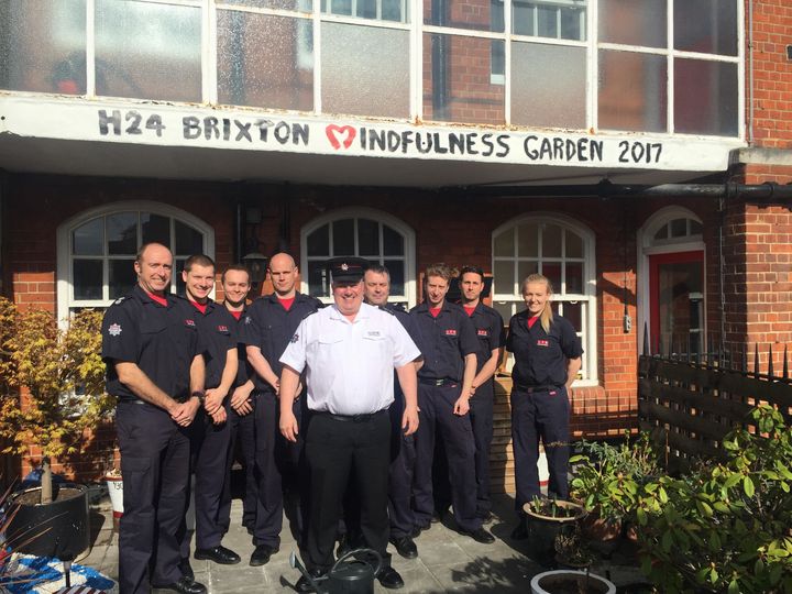 Brixton Fire Brigade's green watch with Mat Rosendale (centre) and green champion Simon Jakeman (far left).