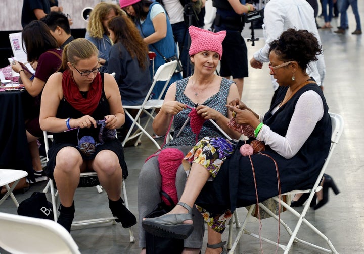 Women knit “pussy hats” at the XXX panel during Politicon at Pasadena Convention Center on July 30, 2017, in Pasadena, Calif. 