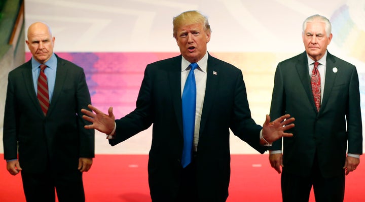 Trump speaks in Manila, the Philippines, on Nov. 14, 2017, as U.S. national security adviser H.R. McMaster and U.S. Secretary of State Rex Tillerson look on.