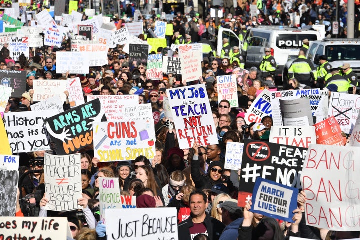 People arrive for the March for Our Lives rally against gun violence in Washington, D.C.