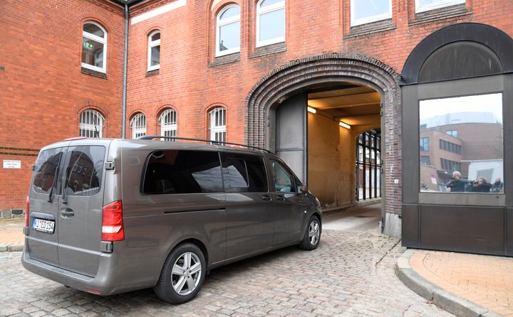 A vehicle, believed to carry detained former Catalan leader Carles Puigdemont, arrives at the prison in Neumuenster, Germany