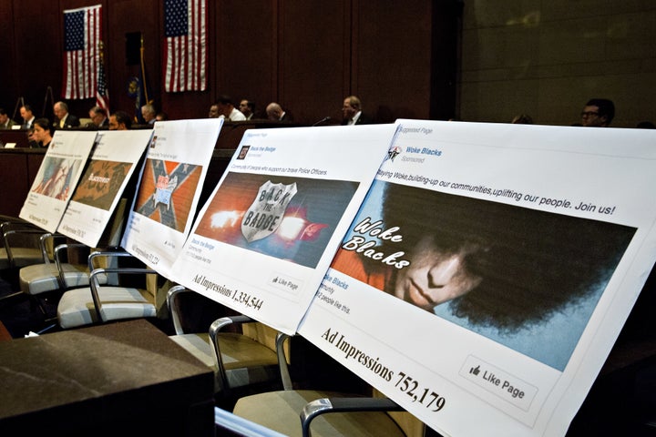 Displays showing social media posts are seen during a House Intelligence Committee hearing in Washington, D.C., U.S., on Wednesday, Nov. 1, 2017.