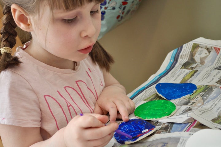 Jo Murricane's daughter Emilia painting her salt dough decorations. 