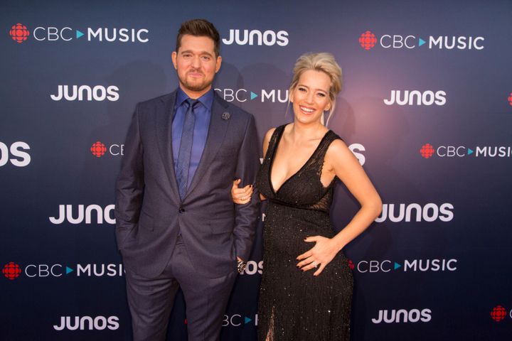 Michael Bublé and his wife, Luisana Lopilato, walk the red carpet at the 2018 Juno Awards.