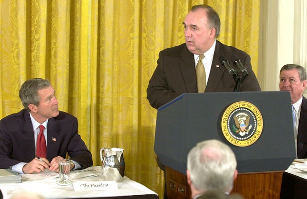 Then-Michigan Gov. John Engler, speaking here in February 2002, spearheaded a historic effort to slash...