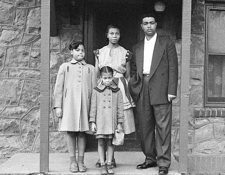 Linda Brown (left) with her parents, Leola and Oliver, and little sister Terry Lynn in front of their house in Topeka, Kansas, in 1954.